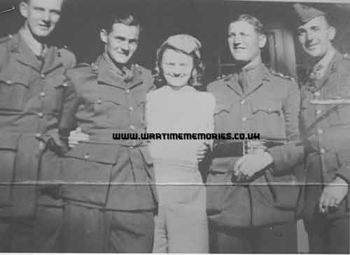 Brian with his then girl friend, Mary Lawrence and his fellow soldiers.
